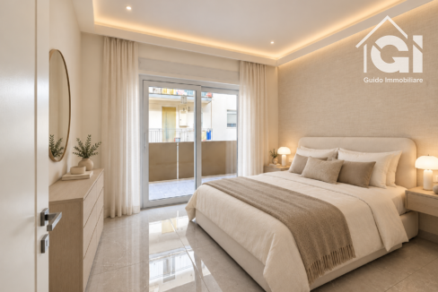 Camera matrimoniale elegante con letto avorio