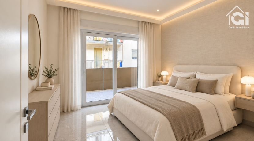 Camera matrimoniale elegante con letto avorio